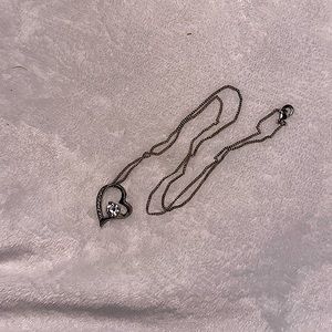 Heart necklace with fake diamond in the middle and oh the sides